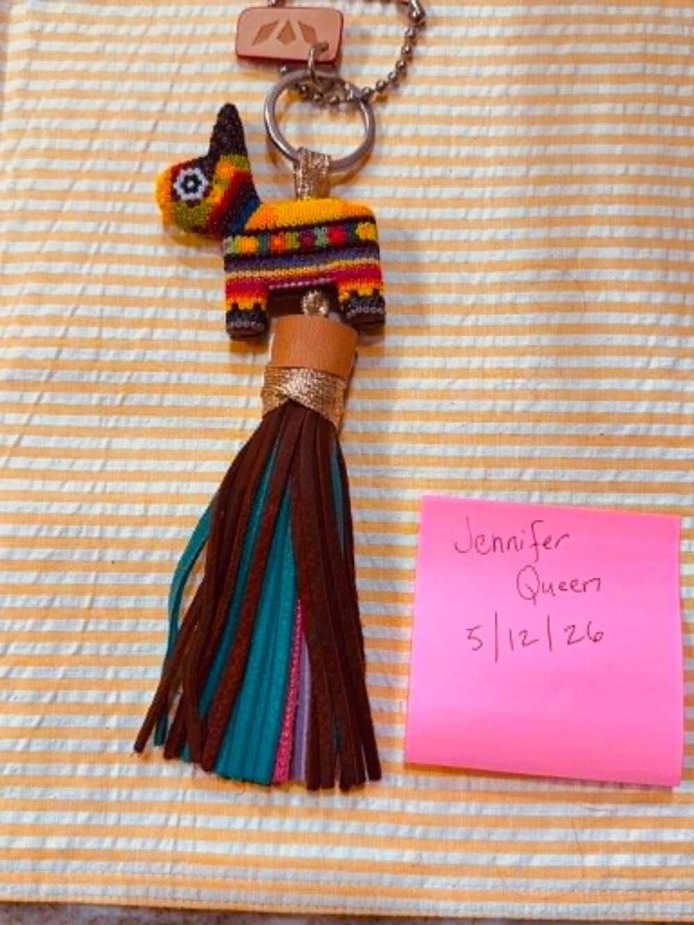 Consuela bag charm and luggage tag